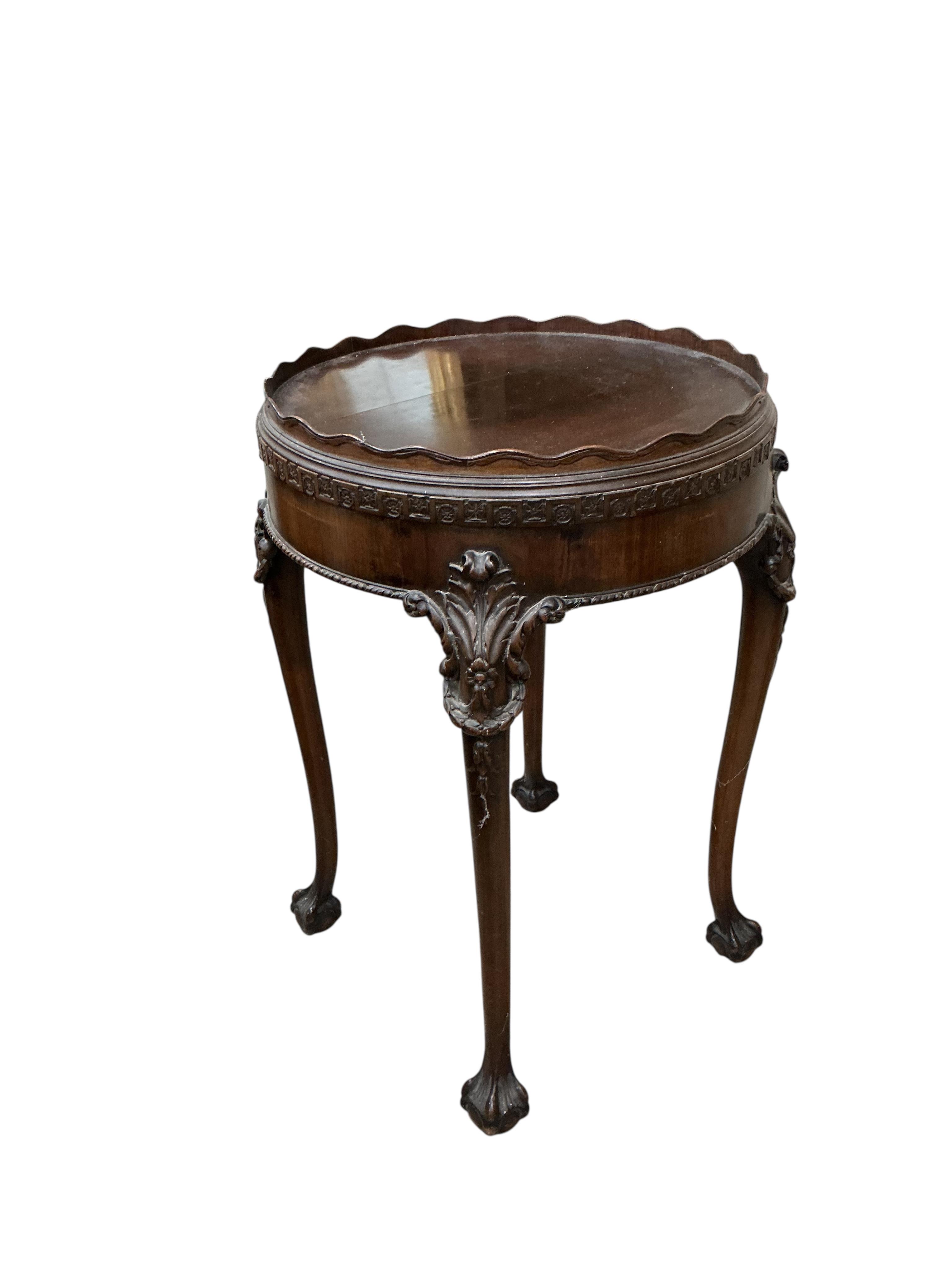 An early 20th century George III style circular mahogany centre table, diameter 52cm, height 79cm